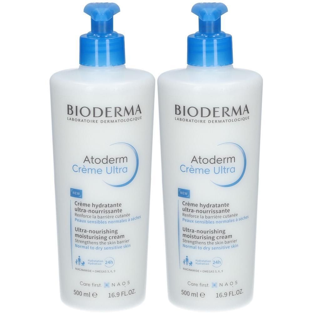 Deux flacons blancs Bioderma Atoderm Crème Ultra avec pompe bleue. Texte: Crème hydratante, Ultra-nourrissante.