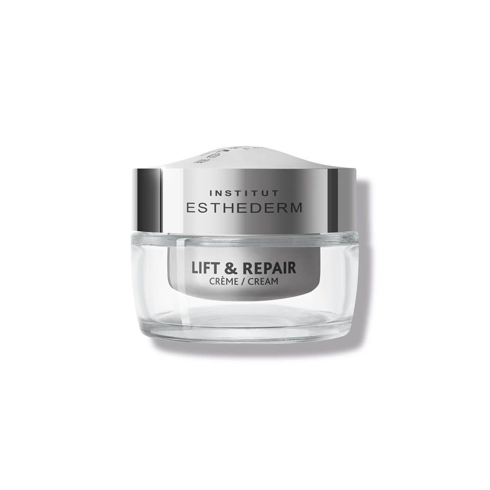 Un pot de crème Institut Esthederm Lift & Repair. Récipient en verre avec couvercle argenté. Texte : Lift & Repair, Crème/Cream.