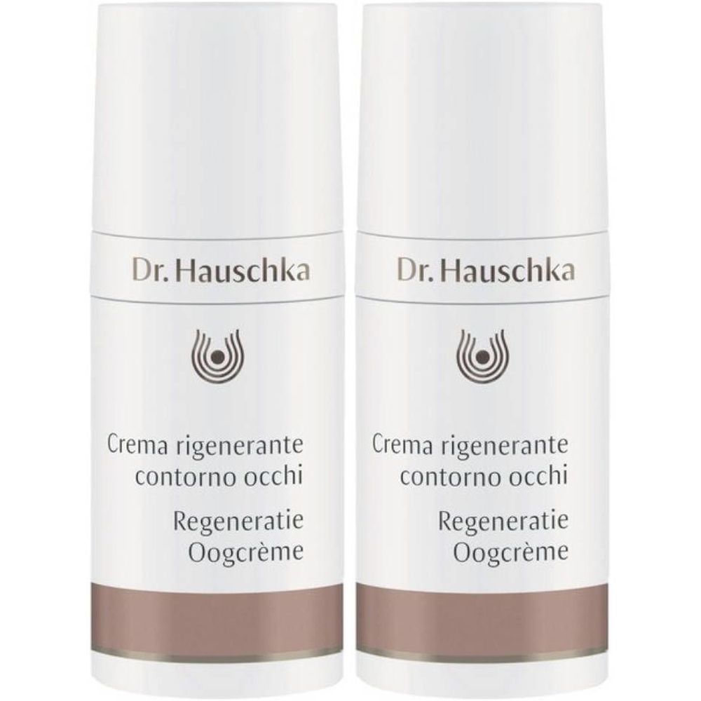 Deux tubes de crème blancs avec une base marron. Inscription : Dr. Hauschka, Crema rigenerante contorno occhi, Regeneratie Oogcrème.