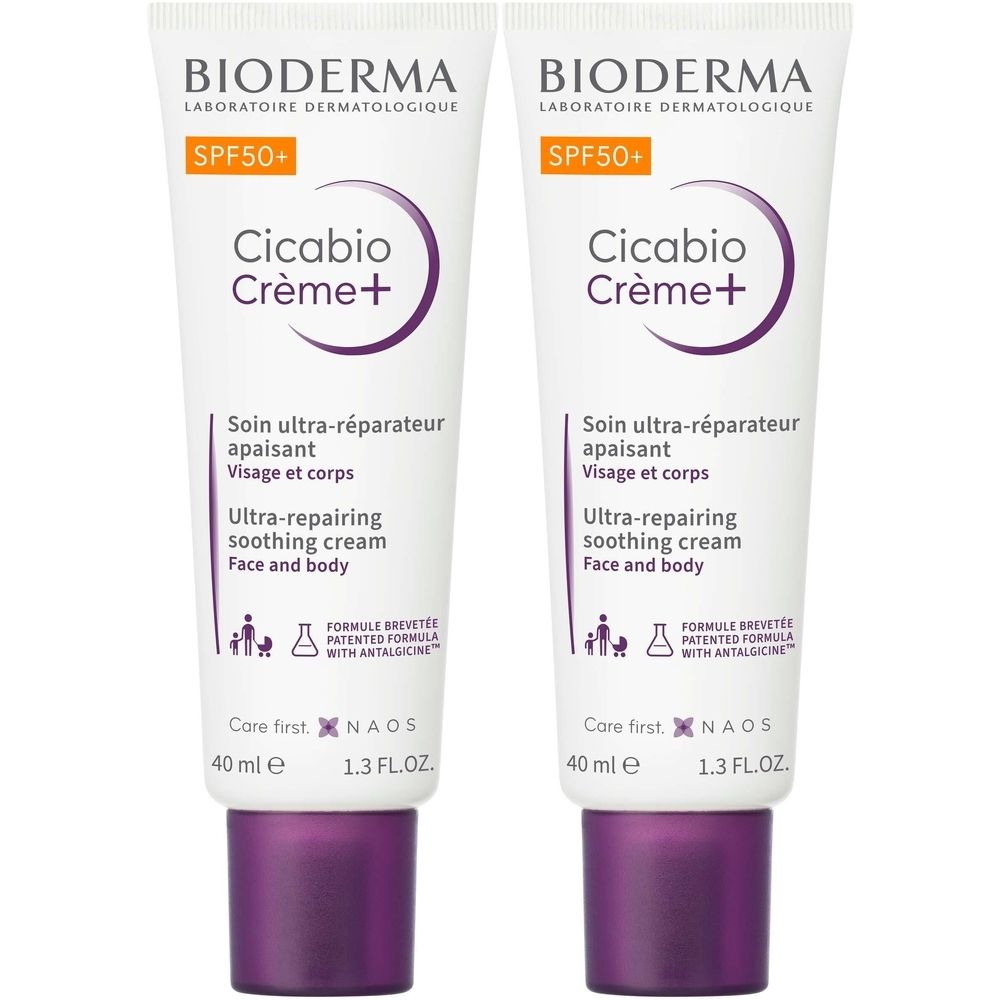 Deux tubes de Bioderma Cicabio Crème+ SPF50+. Tubes blancs avec accents violets et texte. Contient SPF50+.