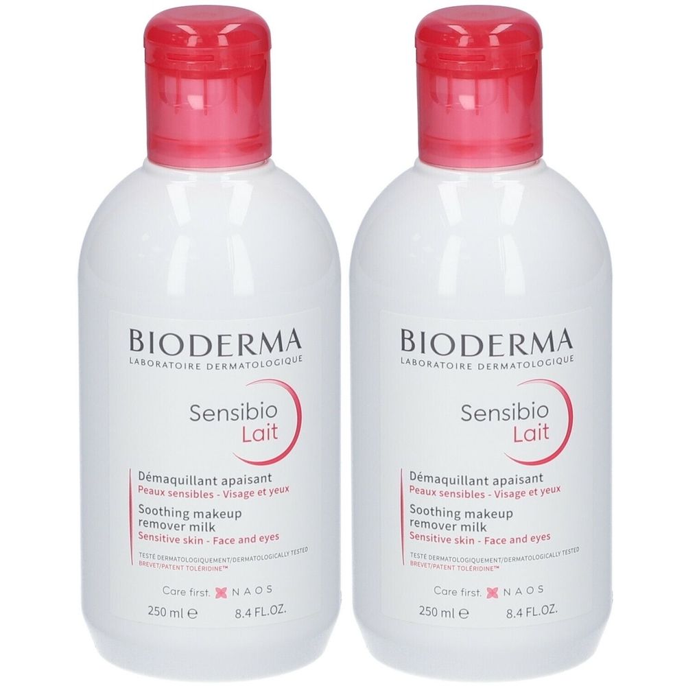 Deux flacons de Bioderma Sensibio Lait. Flacons blancs avec bouchons roses. Inscription: Démaquillant apaisant, Soothing makeup remover milk.