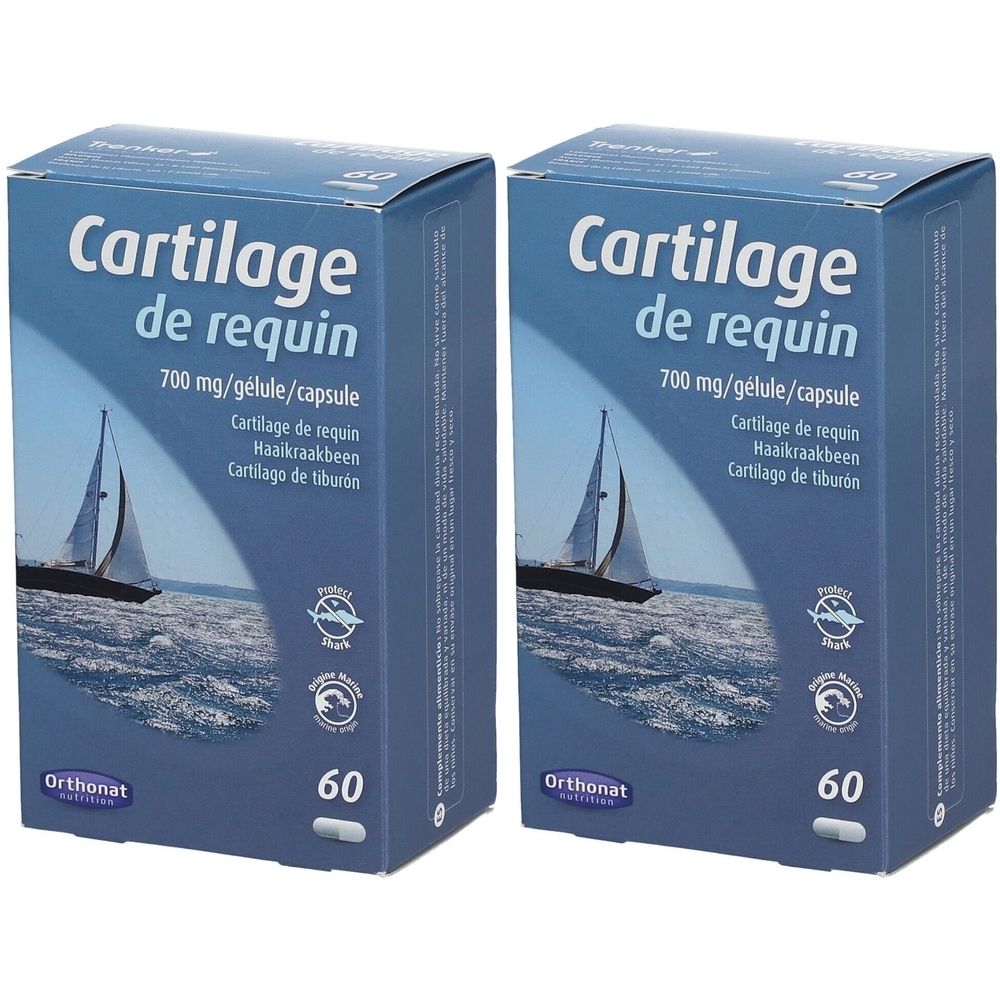 Deux boîtes de "Cartilage de requin". Emballage bleu avec motif de voilier et informations sur le produit.