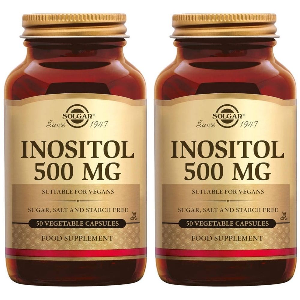 Deux flacons de Solgar Inositol 500 mg. Flacons en verre brun avec bouchons dorés et étiquettes. Inositol 500 mg, convient aux végétaliens.