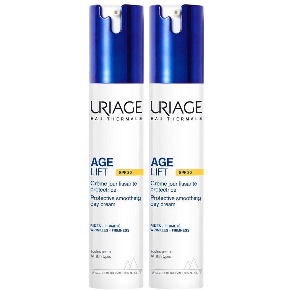 Deux flacons de crème de jour Uriage Age Lift. Étiquette blanche, bouchon bleu. SPF30.