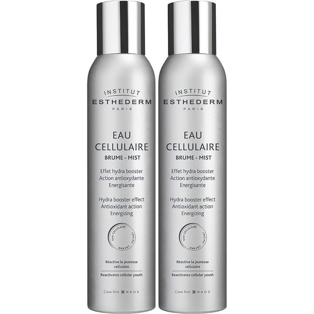 Deux flacons brume argentés. Inscription: Institut Esthederm Eau Cellulaire Brume-Mist. Hydra-Booster, Action antioxydante, Énergisante.