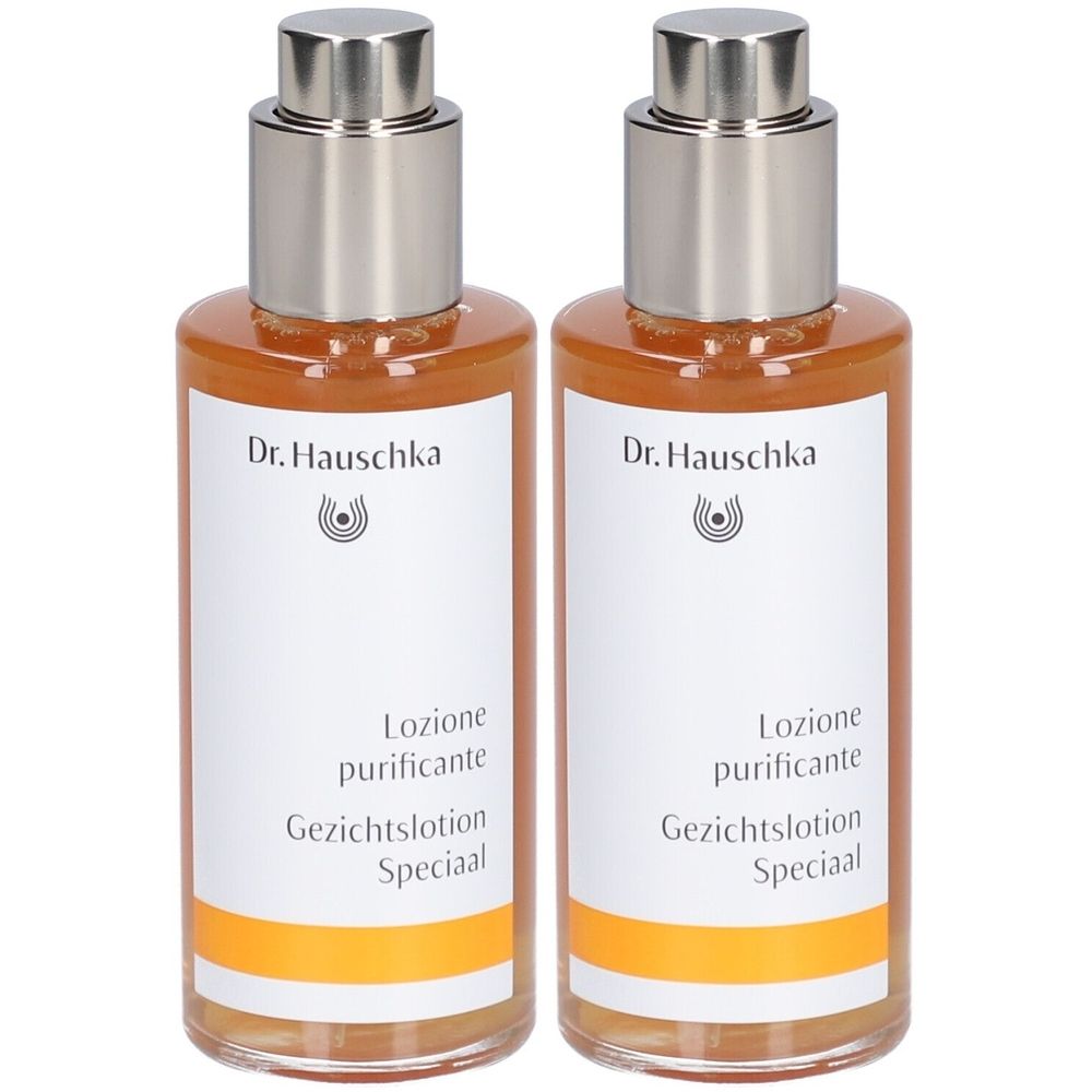 Deux flacons avec bouchons argentés et étiquettes. Inscription : Dr. Hauschka, Lozione purificante, Gezichtslotion Speciaal.
