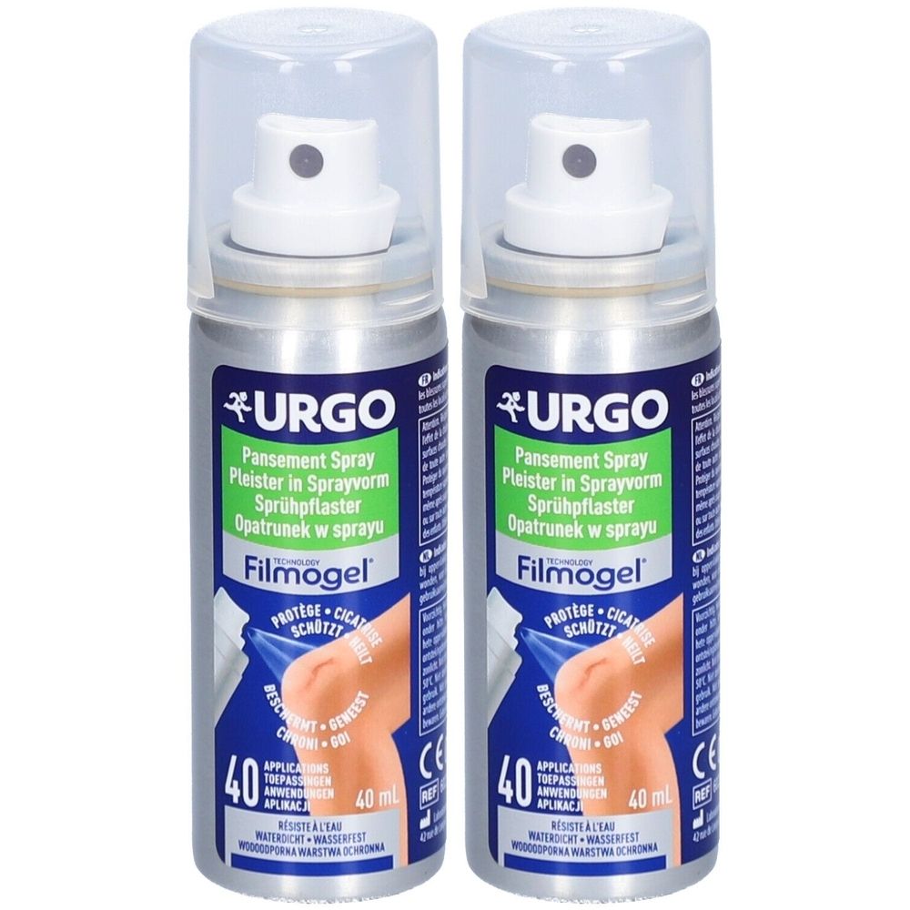 Deux flacons de spray URGO Pansement. Récipients argentés avec tête de pulvérisation blanche et capuchon transparent. Nom du produit et logo.
