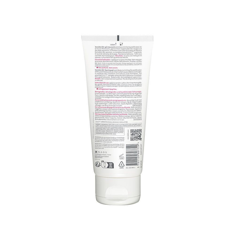 Dos d'un tube blanc. Texte multilingue. Inscription BIODERMA. Code QR et logos.