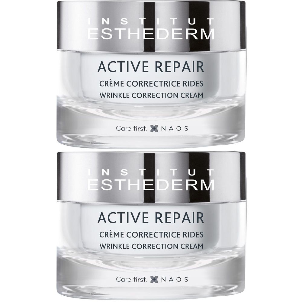 Deux pots de crème INSTITUT ESTHEDERM Active Repair. Couvercle argenté, pots transparents. Texte : ACTIVE REPAIR, Crème correctrice rides, Wrinkle correction cream.