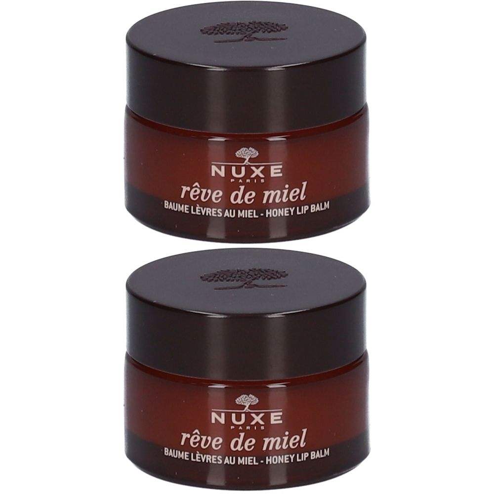 Deux petits pots bruns avec couvercles. Inscription "Nuxe Rêve de Miel Baume Lèvres au Miel - Honey Lip Balm" sur les pots.