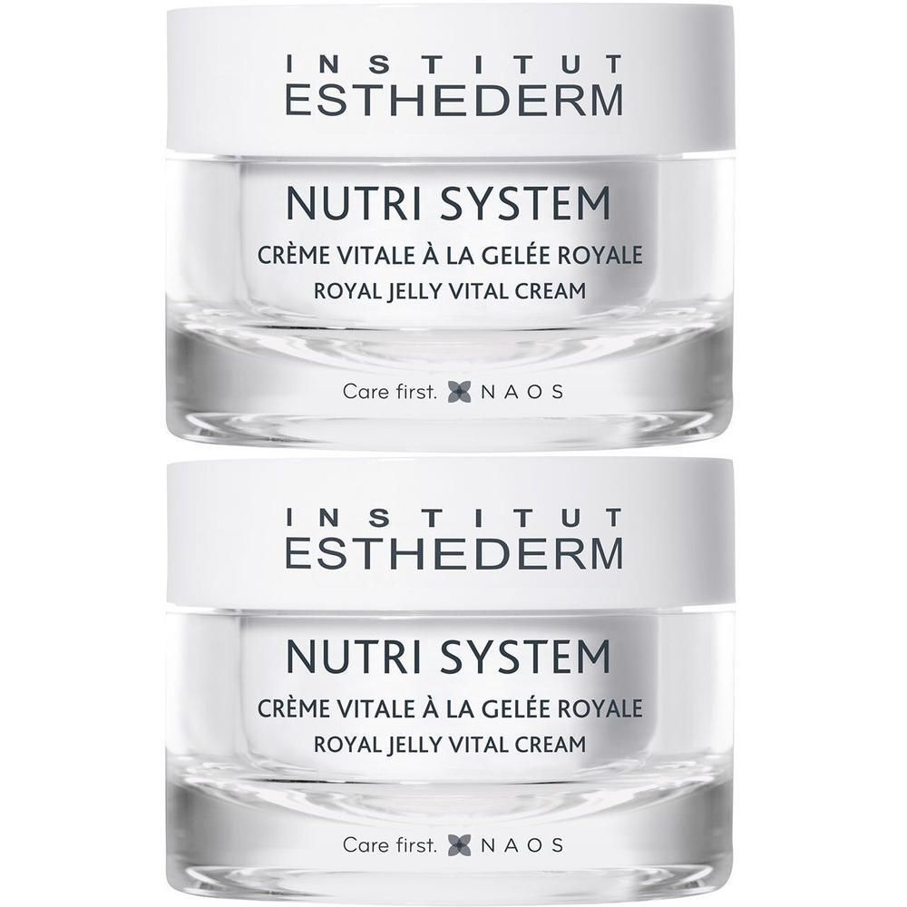 Deux pots de crème Institut Esthederm Nutri System Crème Vitale a la Gelée Royale. Couvercles blancs, pots transparents, texte.