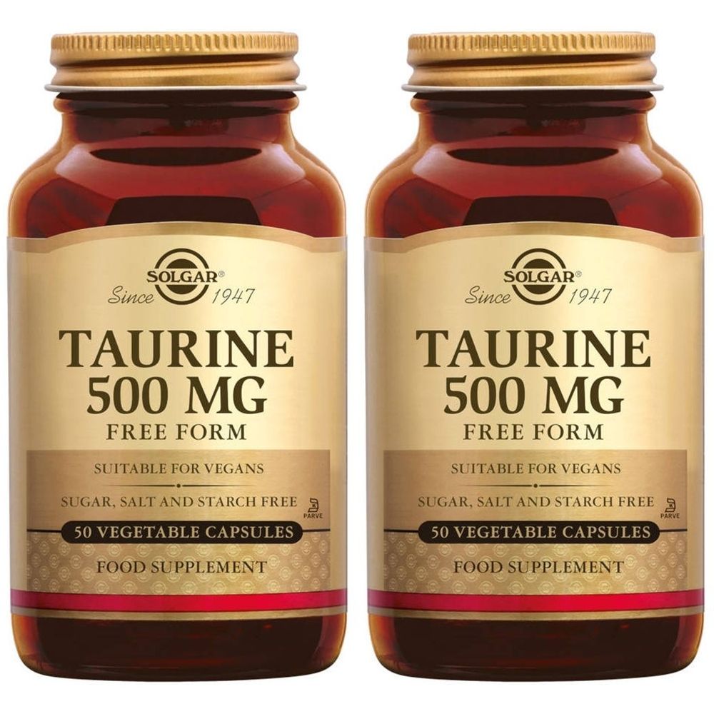 Deux flacons en verre brun avec des couvercles dorés. Les étiquettes indiquent "Taurine 500 MG" et "50 Vegetable Capsules". Marque : Solgar.