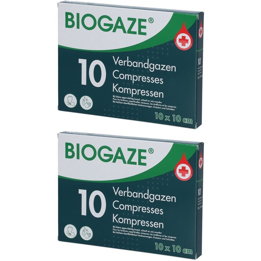 Deux boîtes de compresses. Inscription "BIOGAZE", "10 Compresses", "10 x 10 cm". Emballage vert et blanc avec croix rouge.