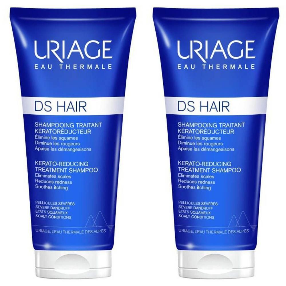 Deux tubes bleus de Uriage DS Hair Shampooing Traitant Kératoréducteur. Texte en français et anglais.