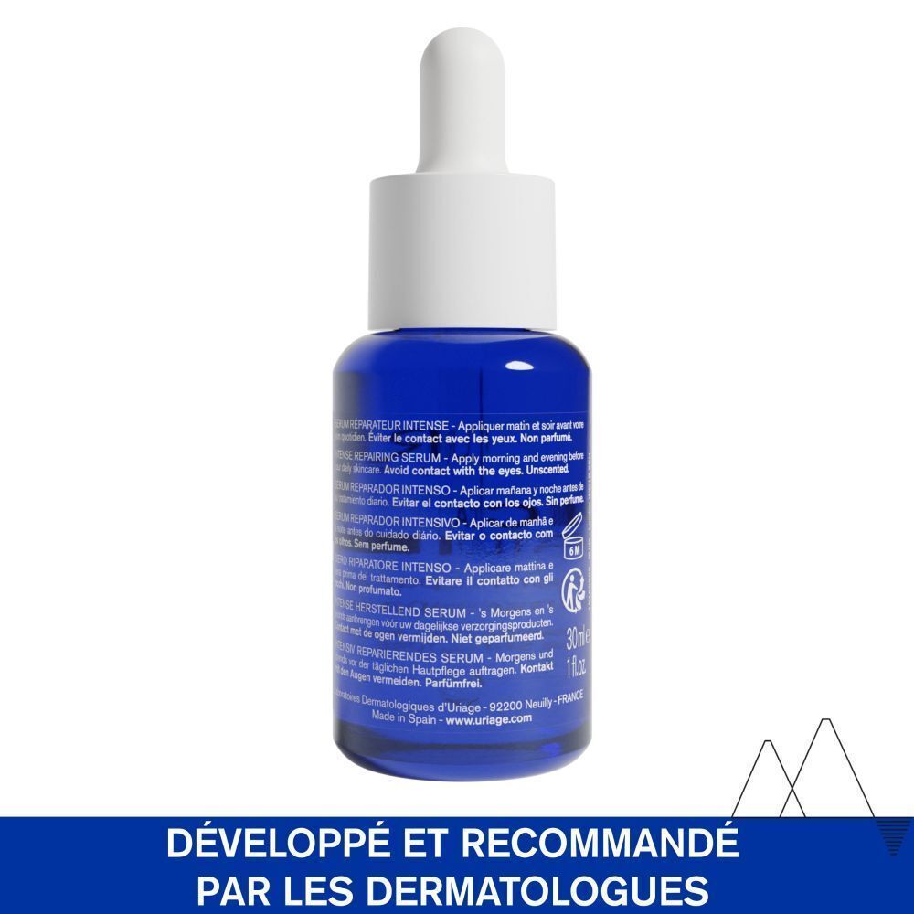 Flacon bleu avec bouchon blanc. Texte: Sérum réparateur intense, 30ml. Développé et recommandé par les dermatologues.