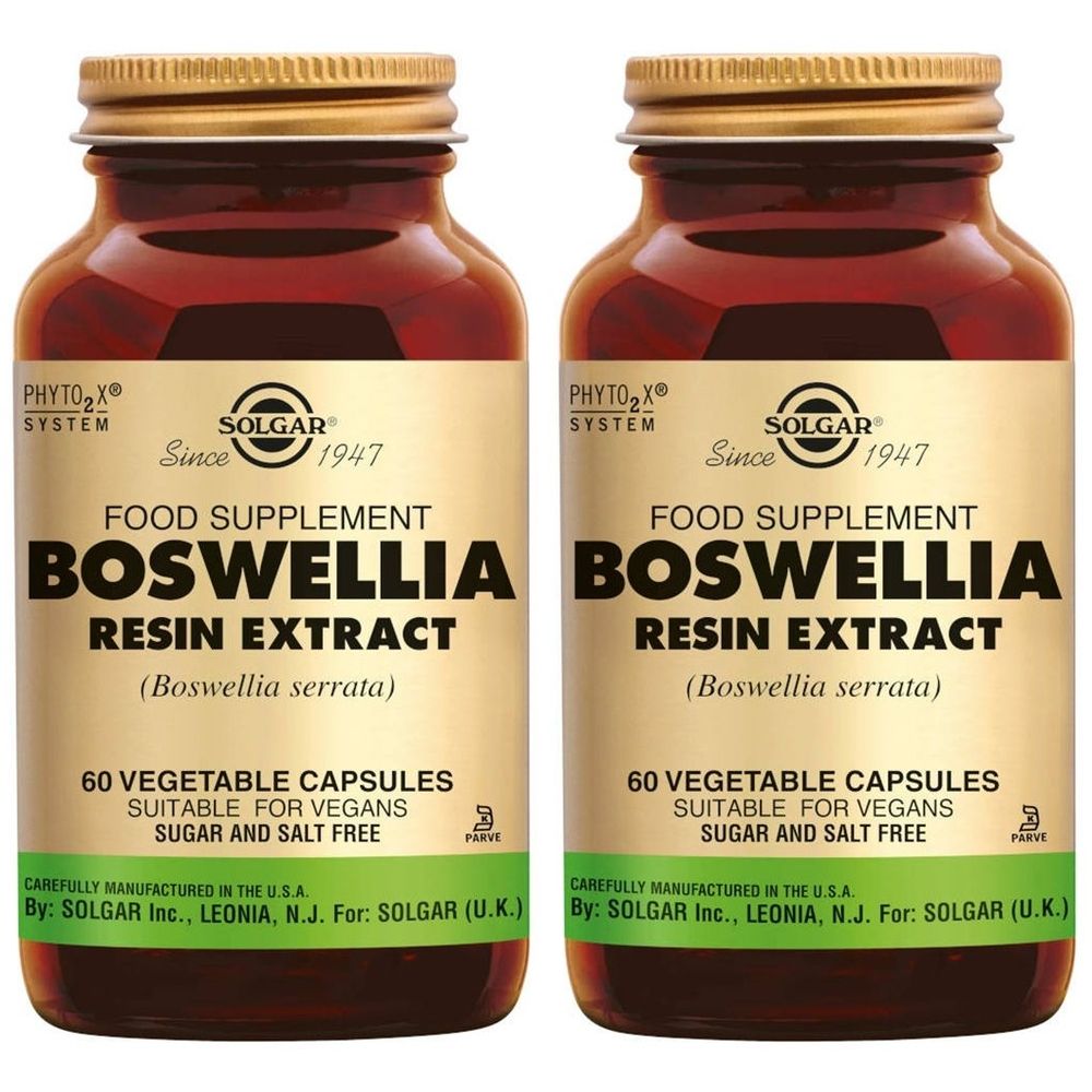 Deux flacons en verre brun avec des couvercles dorés. Les étiquettes indiquent "BOSWELLIA RESIN EXTRACT" et "SOLGAR".