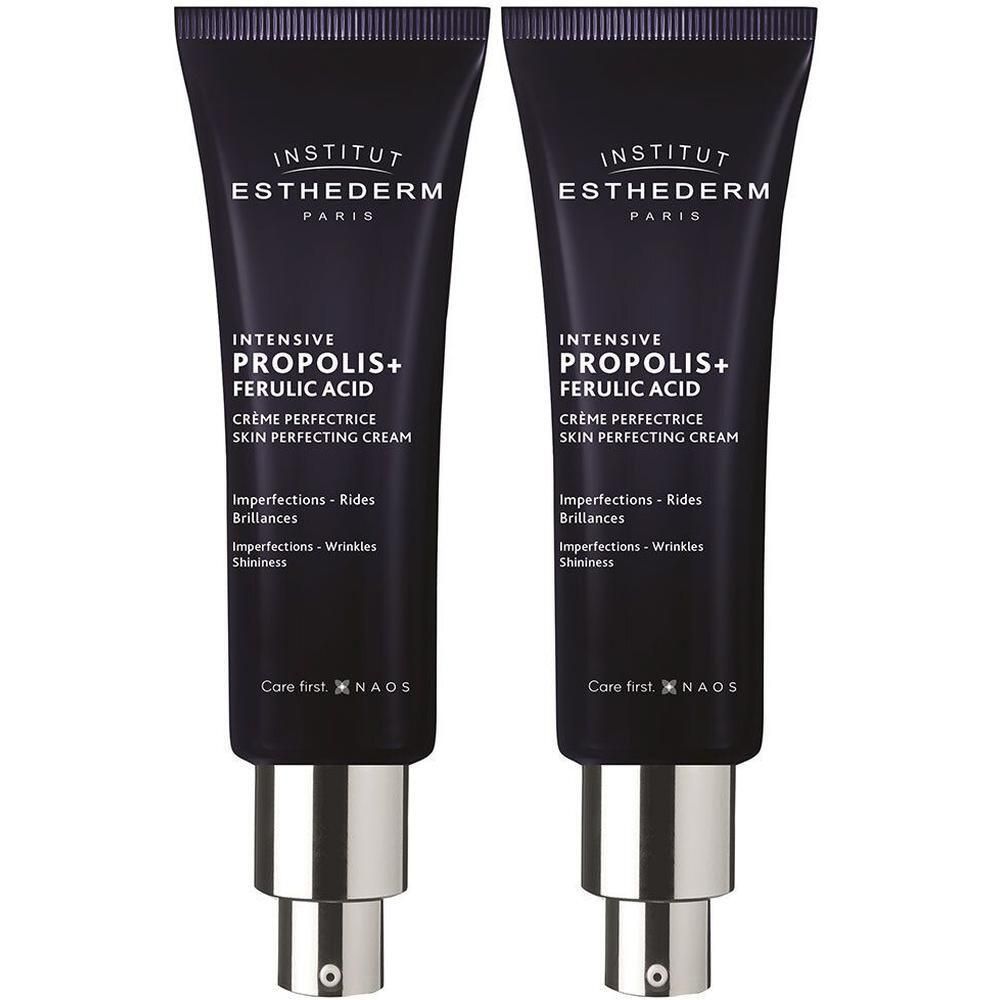 Deux tubes de crème. Tubes bleu foncé avec bouchons argentés. Texte: INSTITUT ESTHEDERM, INTENSIVE PROPOLIS+ FERULIC ACID, Crème Perfectrice.