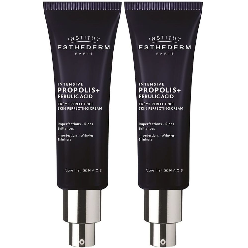 Deux tubes de crème noirs avec bouchons argentés. Inscriptions: INSTITUT ESTHEDERM, INTENSIVE PROPOLIS+ FERULIC ACID, CRÈME PERFECTRICE.