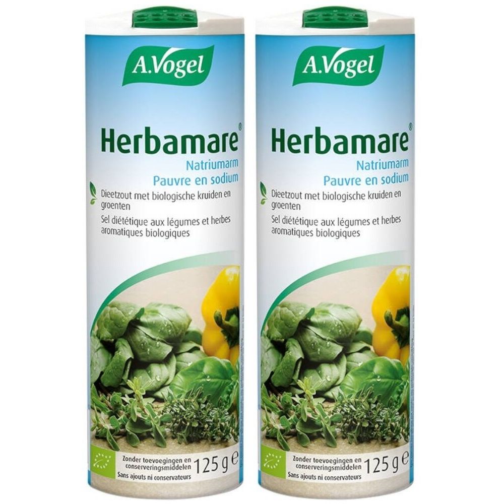 Deux boîtes cylindriques de "Herbamare". Inscription "Pauvre en sodium". Étiquette verte et blanche avec herbes et légumes.