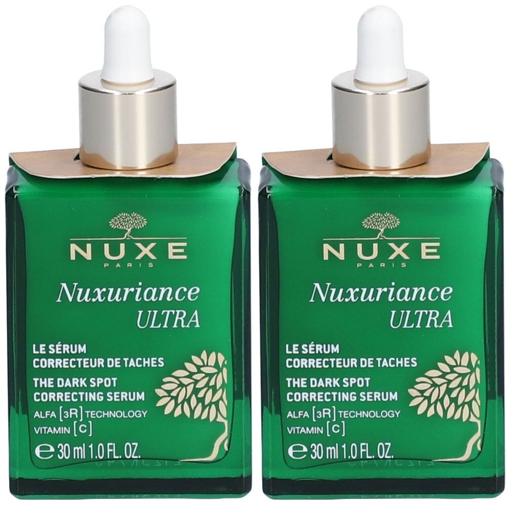 Deux flacons verts avec pipette. Inscription: NUXE, Nuxuriance Ultra, Le Sérum Correcteur de Taches, 30 ml.