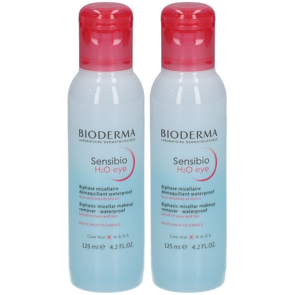 Deux flacons de Bioderma Sensibio H2O eye. Flacons blancs avec bouchon rouge. Texte: Biphase micellaire démaquillant waterproof.