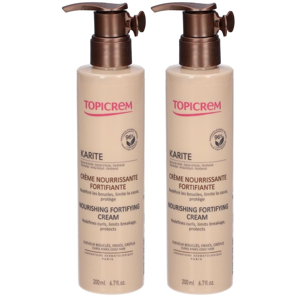 Deux flacons de TOPICREM Karité Crème nourrissante fortifiante avec pompe. Flacons beiges avec pompes marron. Texte en français et en anglais.