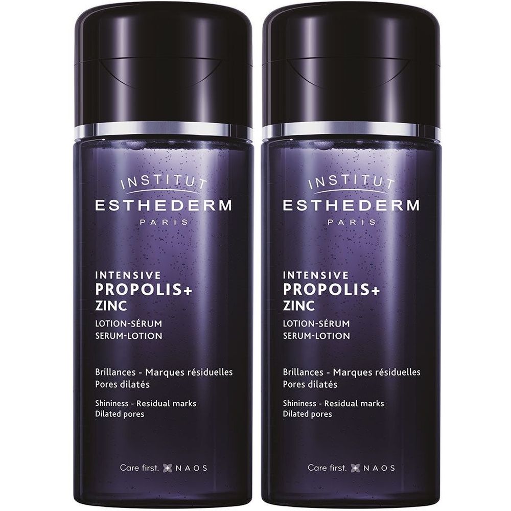 Deux flacons de lotion-sérum. Flacons violets foncés avec bouchon noir. Inscription : INSTITUT ESTHEDERM, INTENSIVE PROPOLIS+ ZINC.