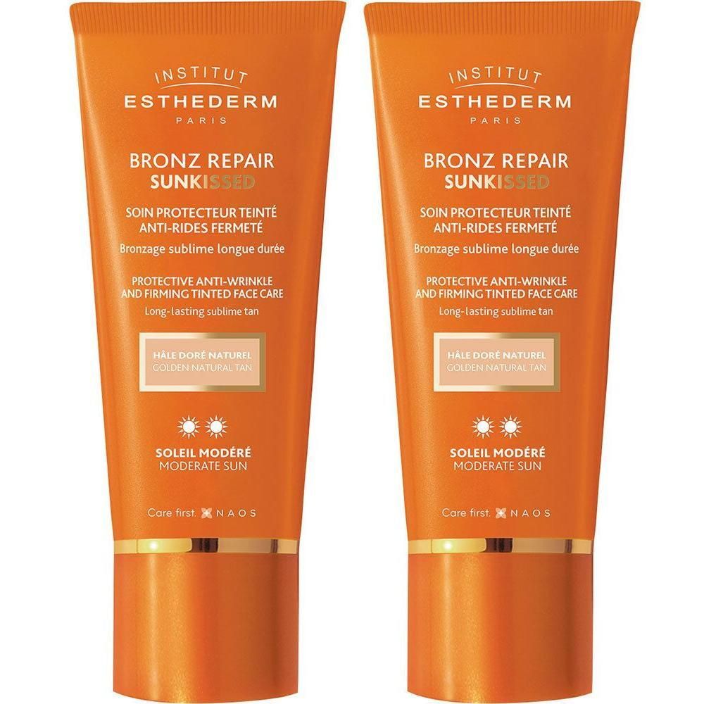 Deux tubes INSTITUT ESTHEDERM Bronz Repair Sunkissed. Emballage orange avec informations et logo.