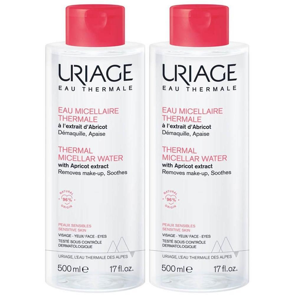 Deux flacons d'Uriage Eau Thermale Micellaire, bouchons roses. Contient extrait d'abricot. Pour peaux sensibles.