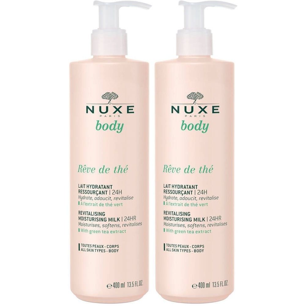 Deux flacons de NUXE Body Rêve de Thé Lait Hydratant Ressourçant. Flacons roses avec pompe blanche. Texte: REVITALISING MOISTURISING MILK 24HR.