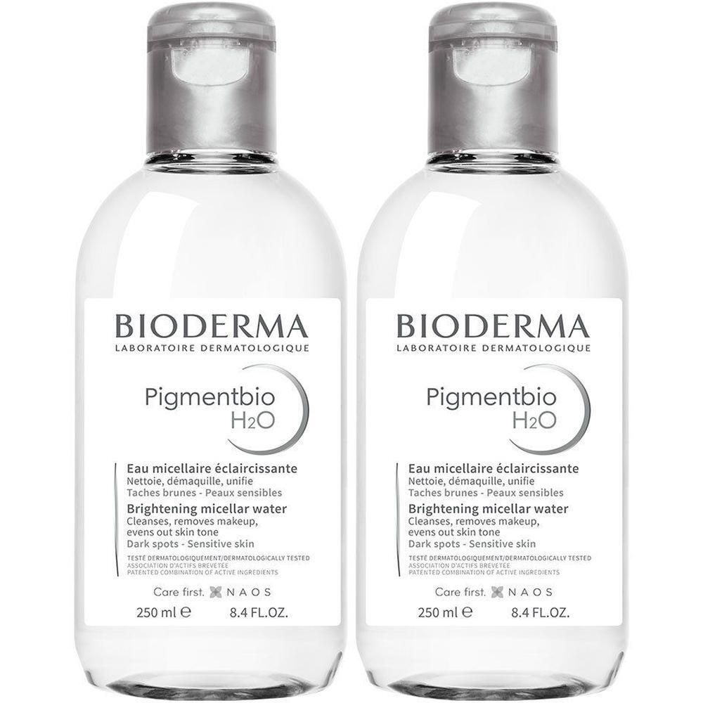 Deux flacons de BIODERMA Pigmentbio H2O. Liquide clair, bouchon argenté, étiquette blanche avec texte.