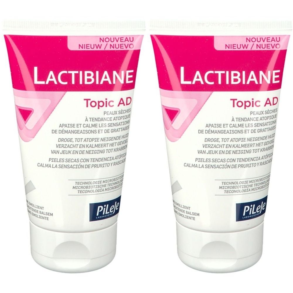 Deux tubes de LACTIBIANE Topic AD. Blanc, avec des accents roses et du texte. Inscription : NOUVEAU, Topic AD, PiLeJe.