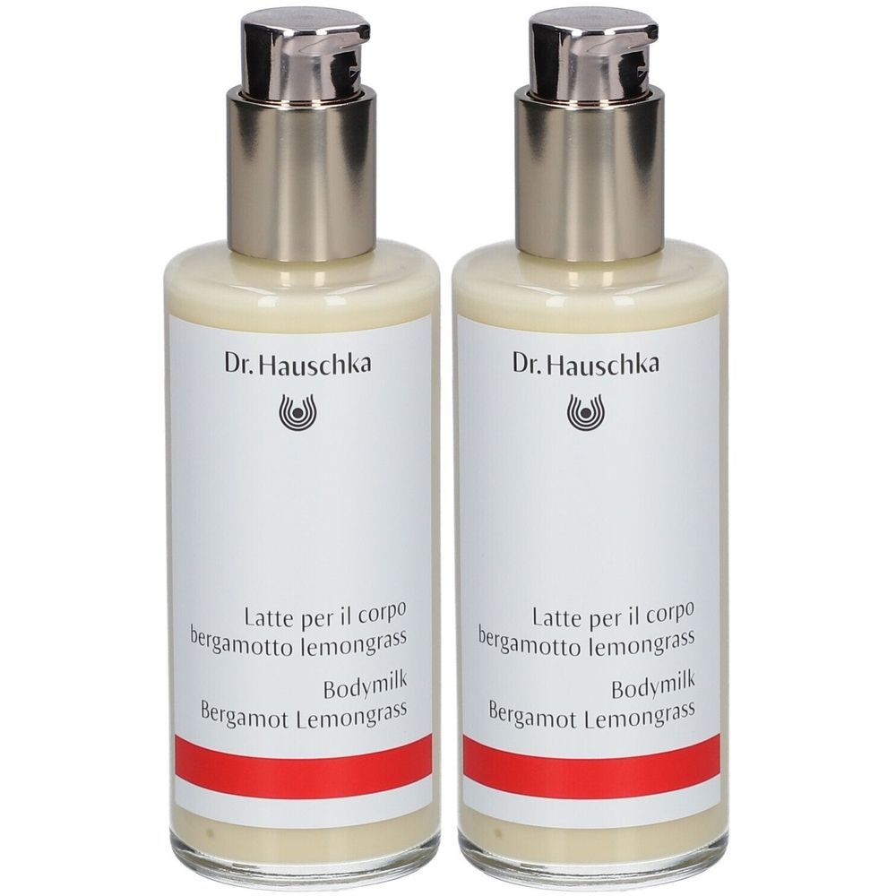 Deux flacons avec pompes argentées. Les étiquettes indiquent "Dr. Hauschka" et des noms de produits en plusieurs langues.