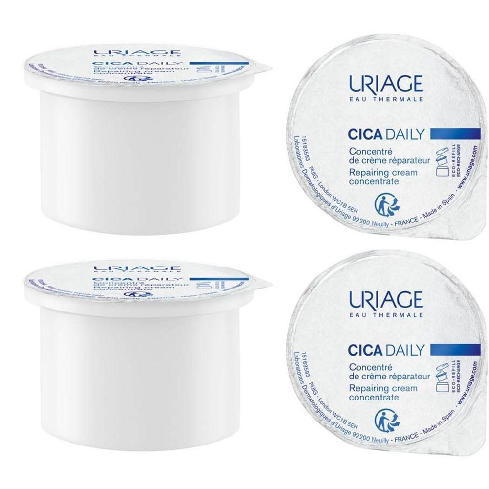 Deux pots de crème blancs avec couvercles. Texte: Uriage, CICA Daily. Couvercles avec texte. Crème réparatrice.