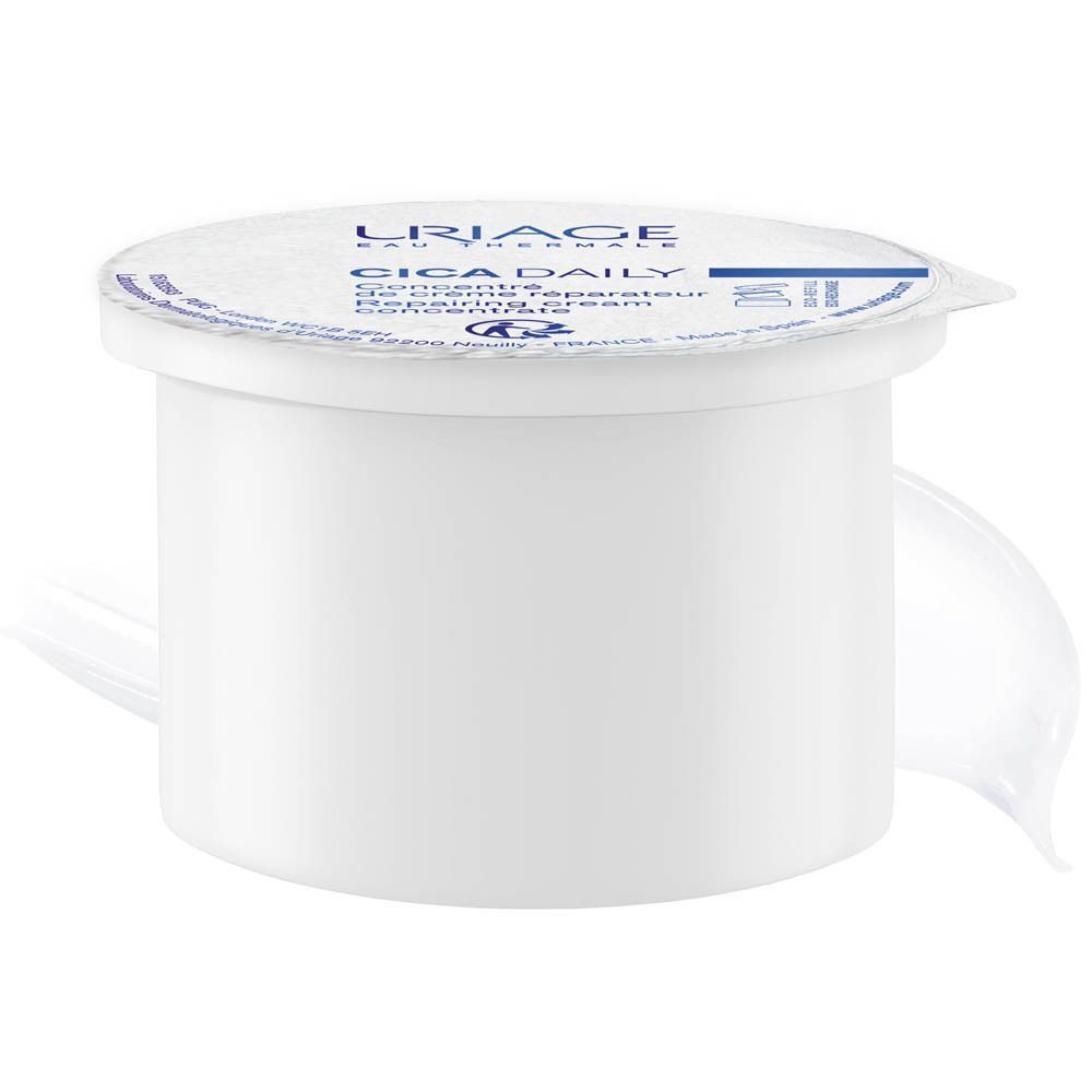 Un pot de crème blanc avec couvercle. Texte: Uriage, CICA Daily. Couvercle avec texte. Crème réparatrice.