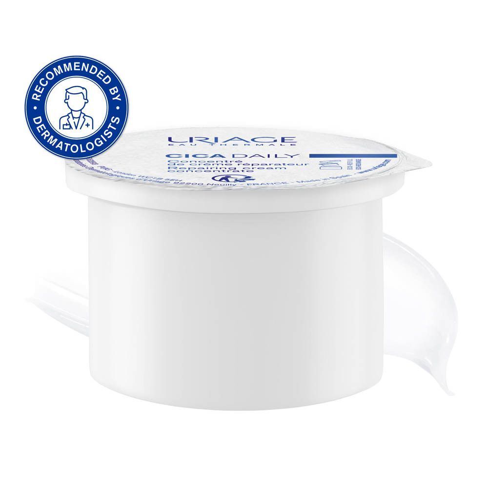 Un pot de crème blanc avec couvercle. Texte: Uriage, CICA Daily. Couvercle avec texte. Recommandé par les dermatologues.