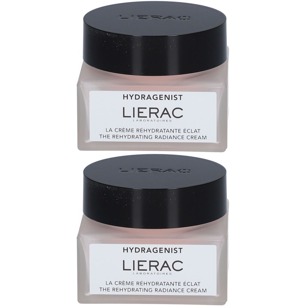 Deux pots de crème avec couvercles noirs. Inscription: HYDRAGENIST, LIERAC, LA CREME REHYDRATANTE ECLAT, THE REHYDRATING RADIANCE CREAM.