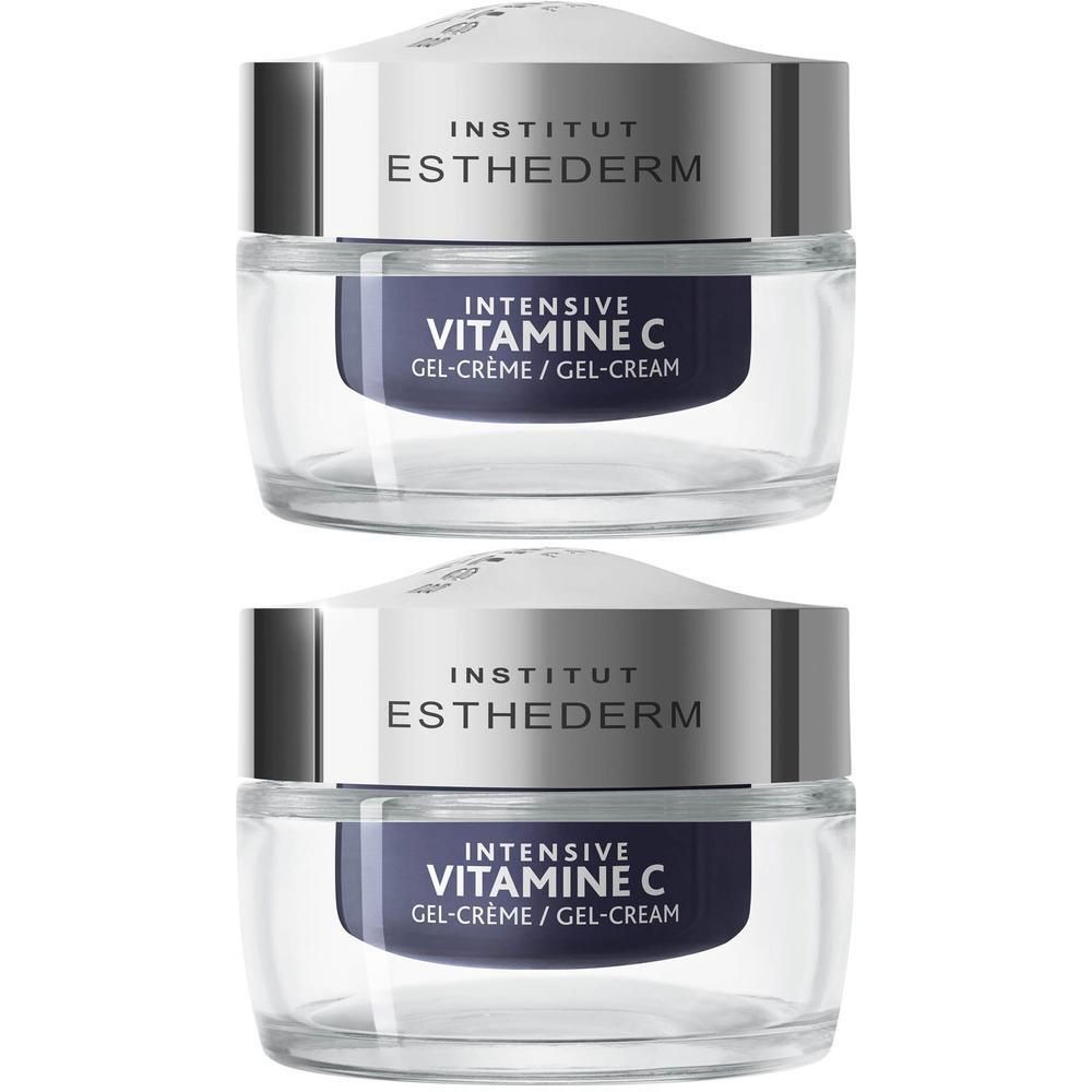 Deux pots de gel-crème Institut Esthederm Intensive Vitamine C. Pot transparent, couvercle argenté. Texte: Intensive Vitamine C Gel-Crème.