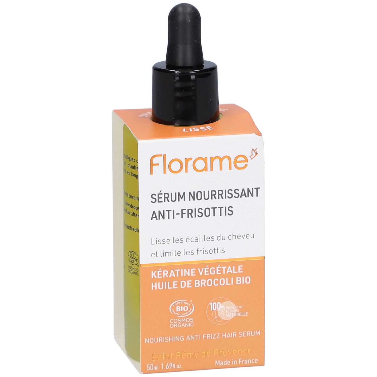 Flacon de sérum avec pipette noire dans une boîte orange. La boîte indique "Sérum Nourrissant Anti-Frisottis".