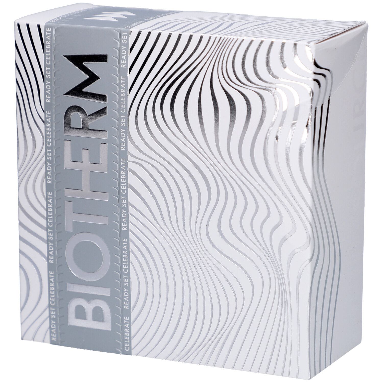 Boîte blanche avec motif ondulé et logo BIOTHERM. Bande argentée avec l'inscription READY SET CELEBRATE.