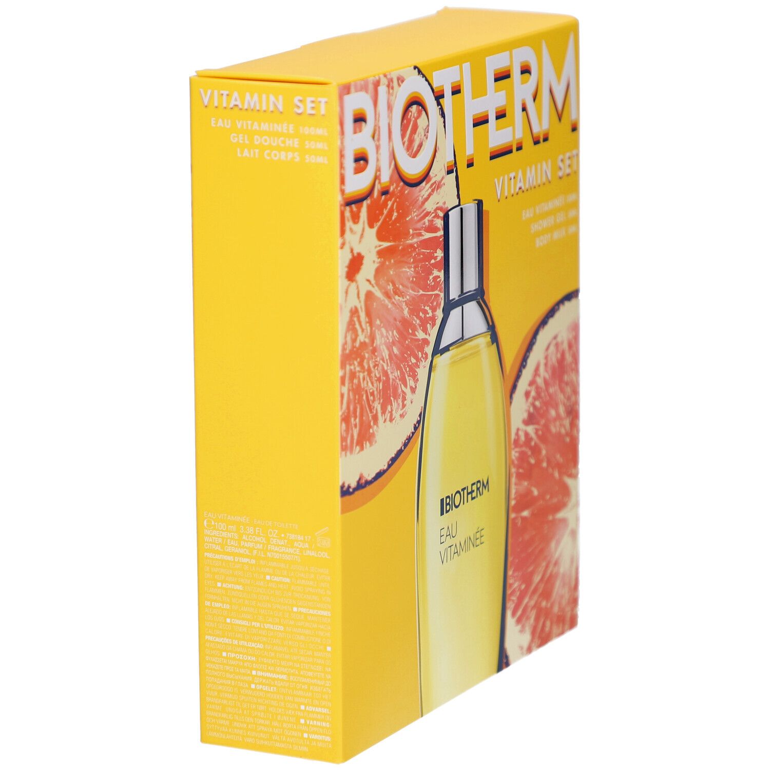 Boîte jaune, vue latérale. Logo BIOTHERM et nom du produit visibles. Design pamplemousse. Texte: Eau Vitaminée.