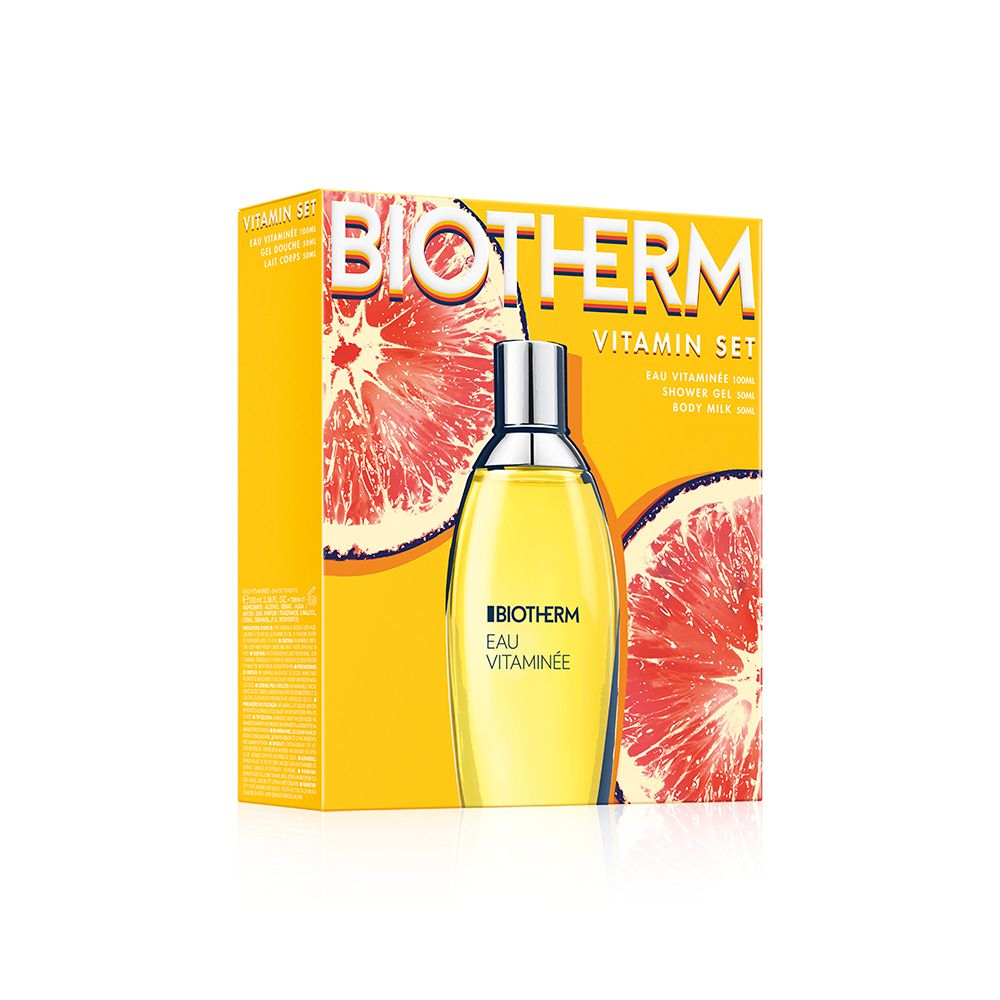 Coffret BIOTHERM Eau Vitaminée. Liquide jaune en flacon de verre. Emballage jaune avec texte et motif pamplemousse. Bouchon argenté.