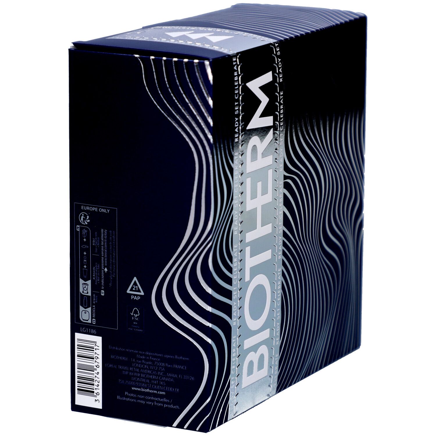 Coffret cadeau bleu avec motifs ondulés argentés. Inscription "BIOTHERM" en grand. Dos avec texte et logos.