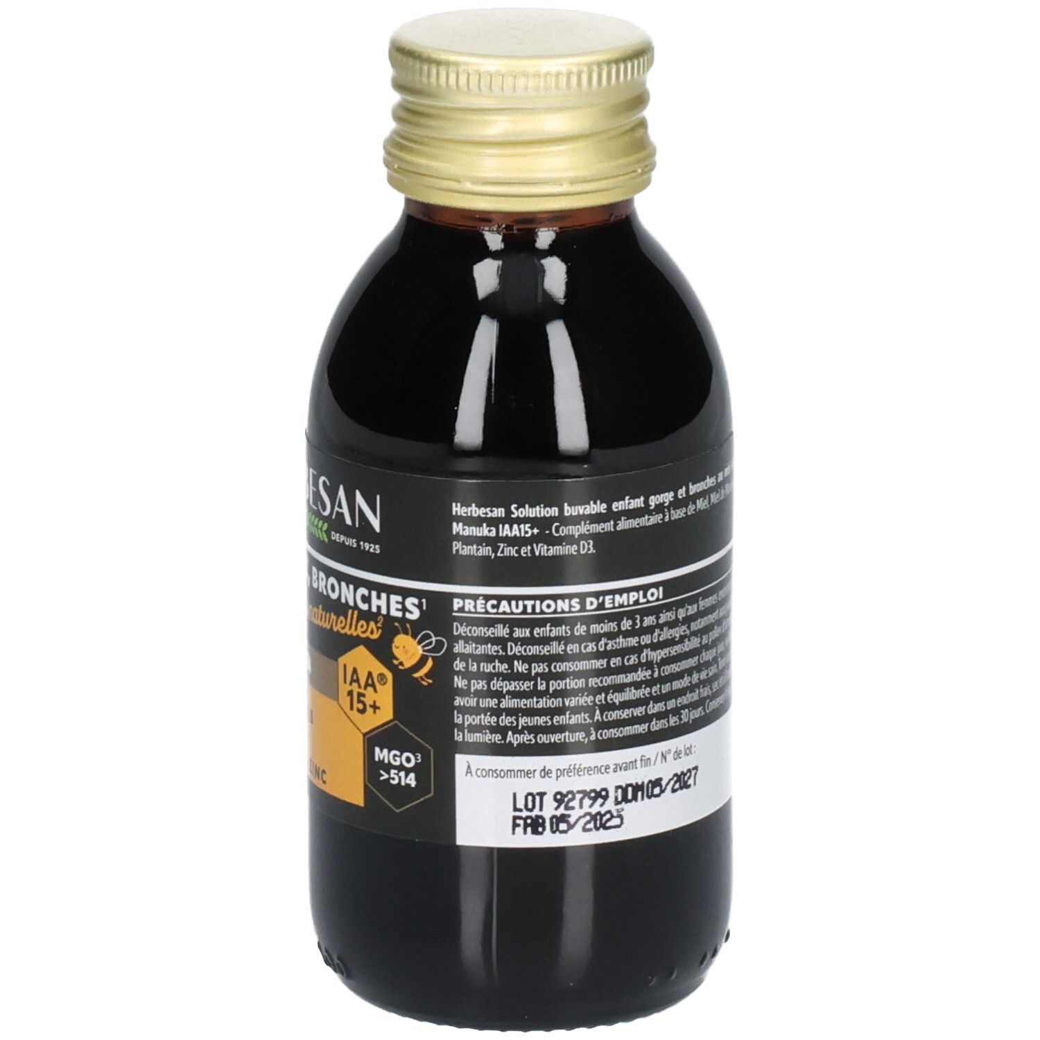 Vue arrière de la bouteille en verre brun avec bouchon doré. Étiquette avec informations produit et précautions d'emploi.