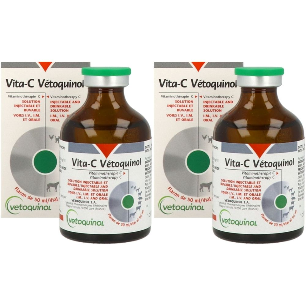 Flacons en verre brun avec bouchon vert et emballage blanc. Inscription : Vita-C Vétoquinol. Solution injectable et buvable.