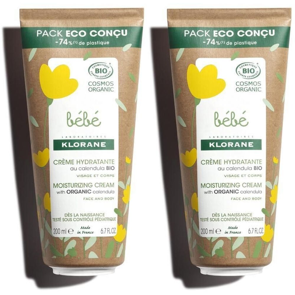 Deux tubes de crème hydratante KLORANE Bébé. Inscription: Crème hydratante au calendula BIO. Certifié COSMOS ORGANIC. Emballage en matériau recyclé.