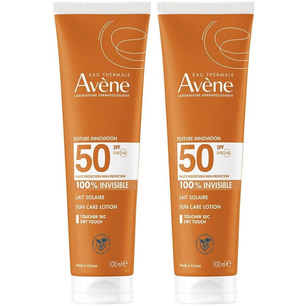 Deux tubes de crème solaire orange avec bouchon blanc. Inscription : Avène, SPF 50, 100% Invisible, Lait Solaire.