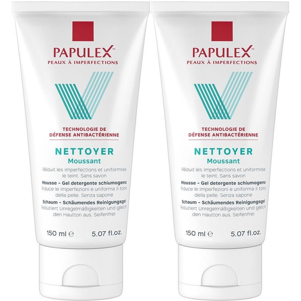 Deux tubes blancs avec texte. PAPULEX, NETTOYER Moussant, 150 ml. Logo rouge et bleu. Contient des informations en plusieurs langues.