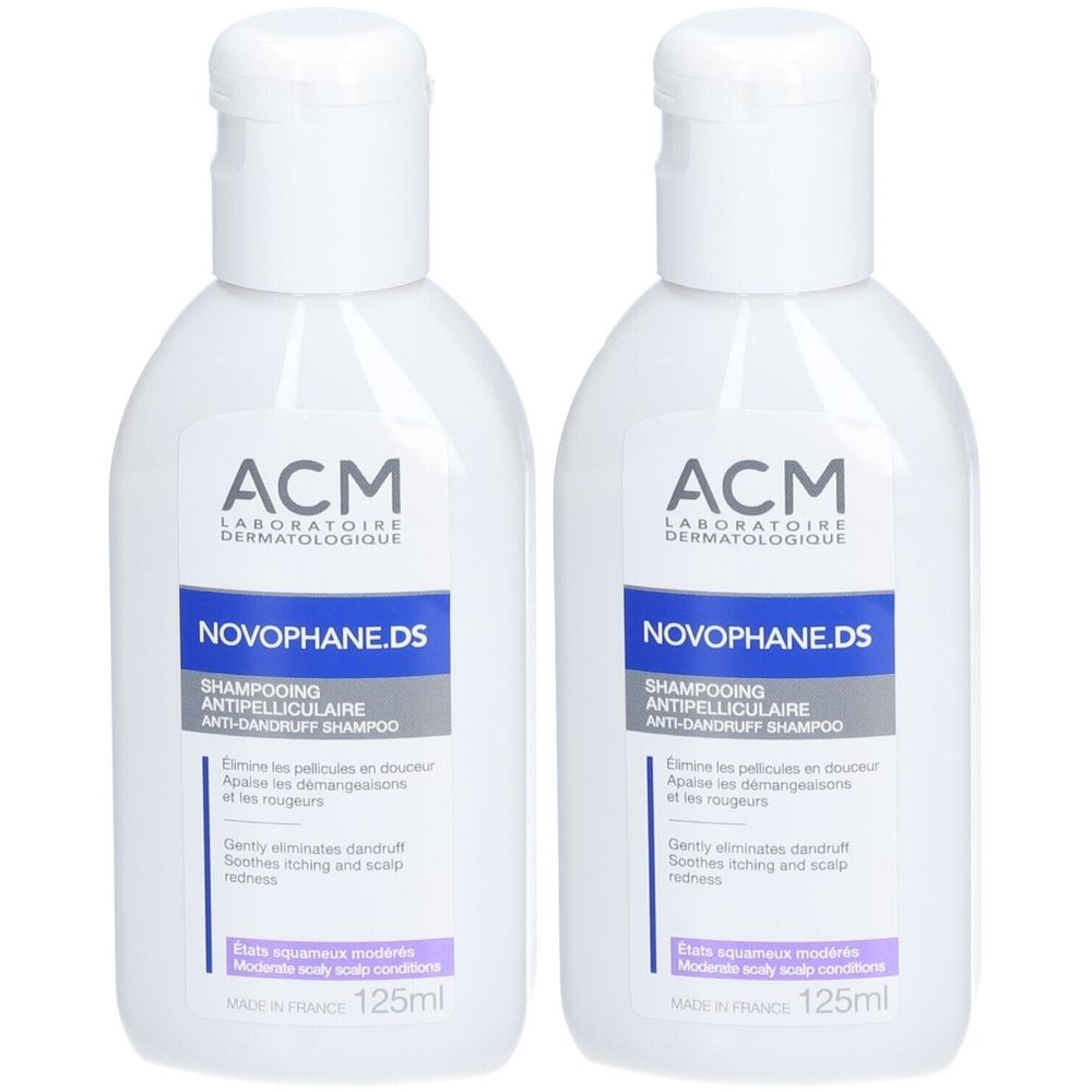 Deux flacons blancs avec bouchon rabattable. Inscription: ACM Novophane.DS Shampooing Antipelliculaire. 125ml.