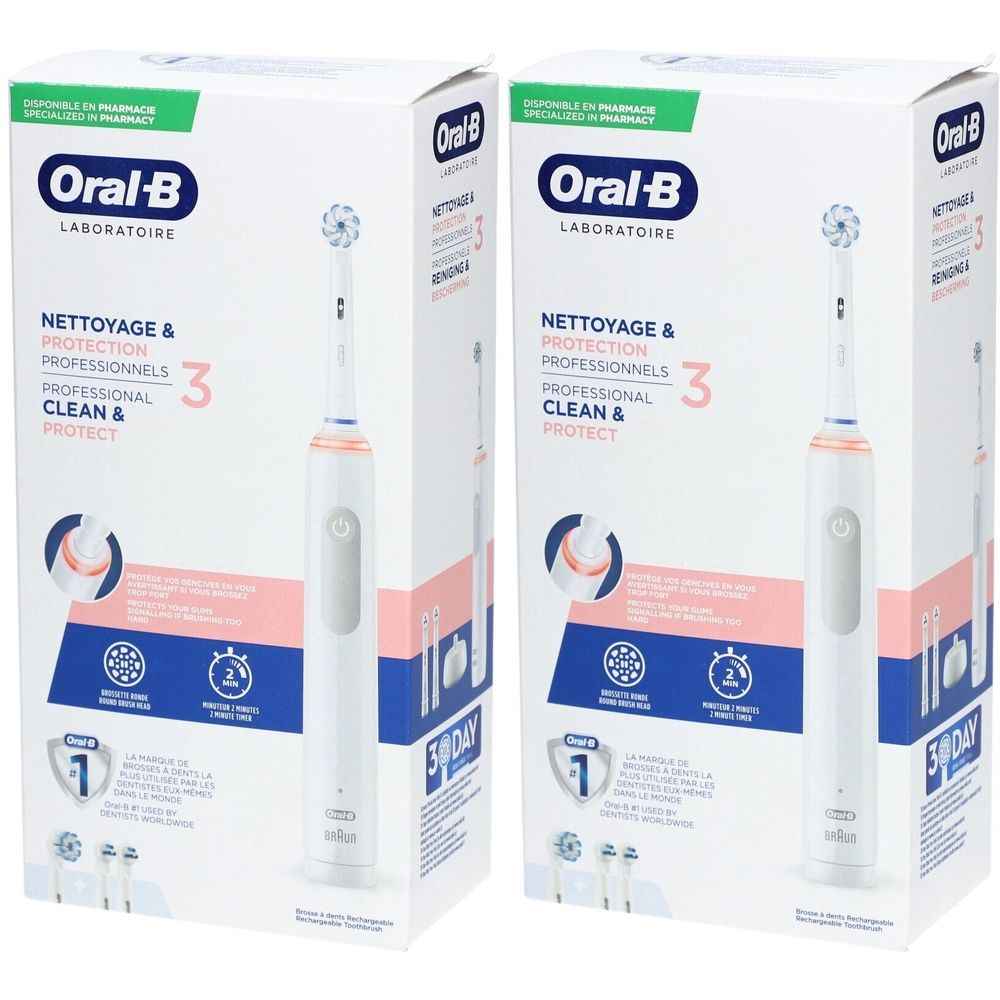 Deux brosses à dents électriques dans leur emballage. L'emballage affiche la marque Oral-B et des informations sur le produit.
